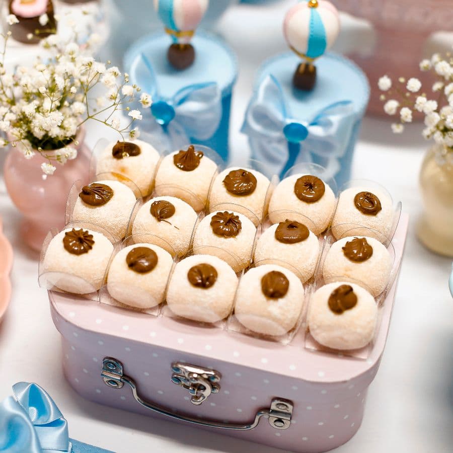 Pastel dessert table with assorted sweet treats