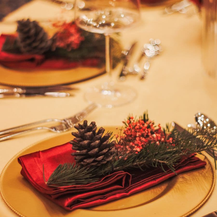 Pinecone and pine place setting on a holiday table