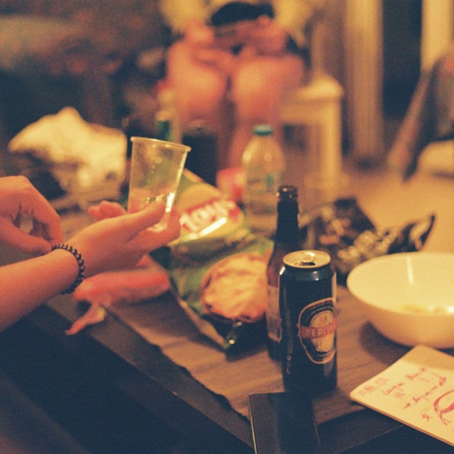 Table of drinks and snacks at a casual house party