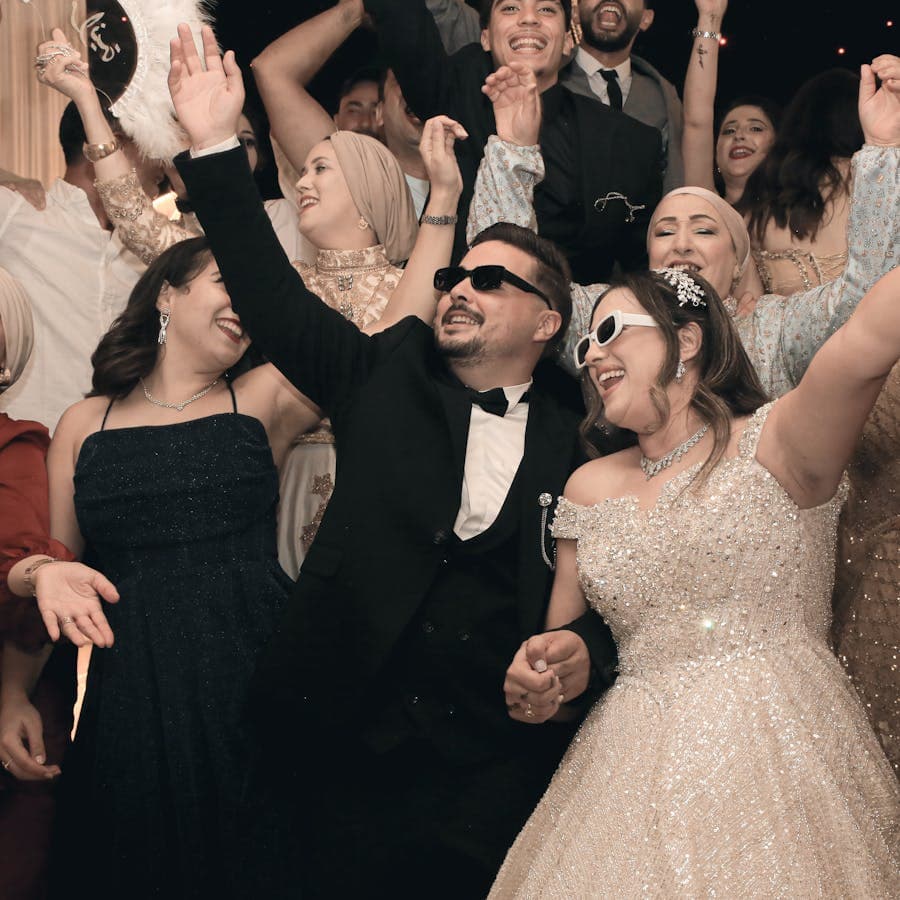 Wedding guests dancing joyfully together